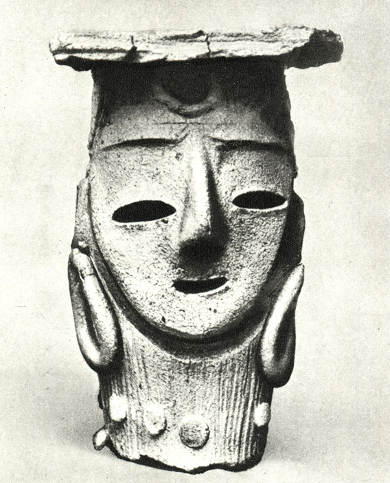 Скульптура женской головы. Глина. Доисторический период. Высота 18,6 см. Камакура